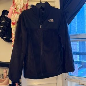 Black fuzzy North Face jacket